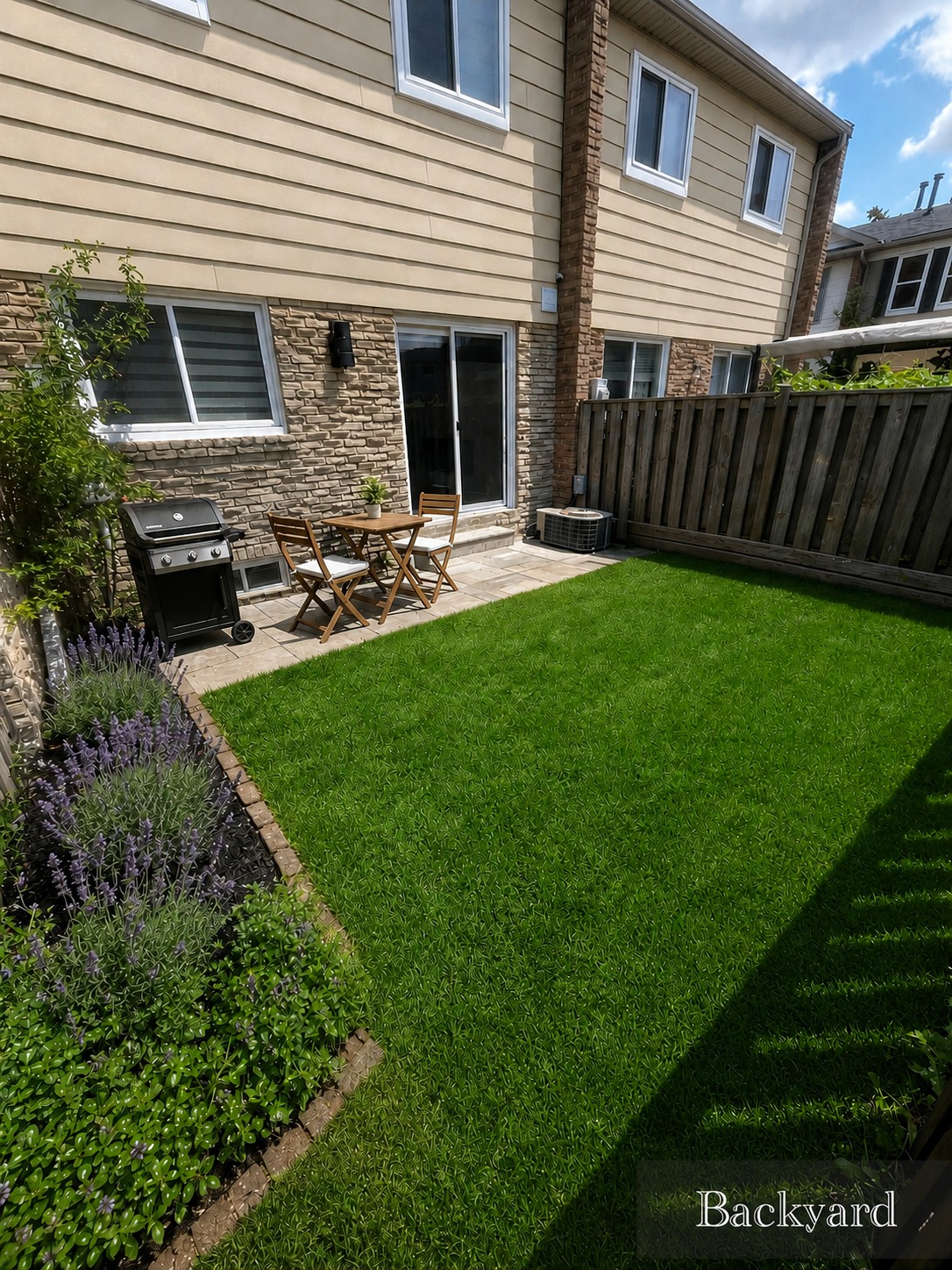 Private fenced backyard